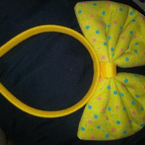 Girls yellow polka dot hand band/bow